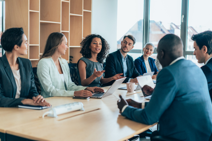 Diverse team working together around a table